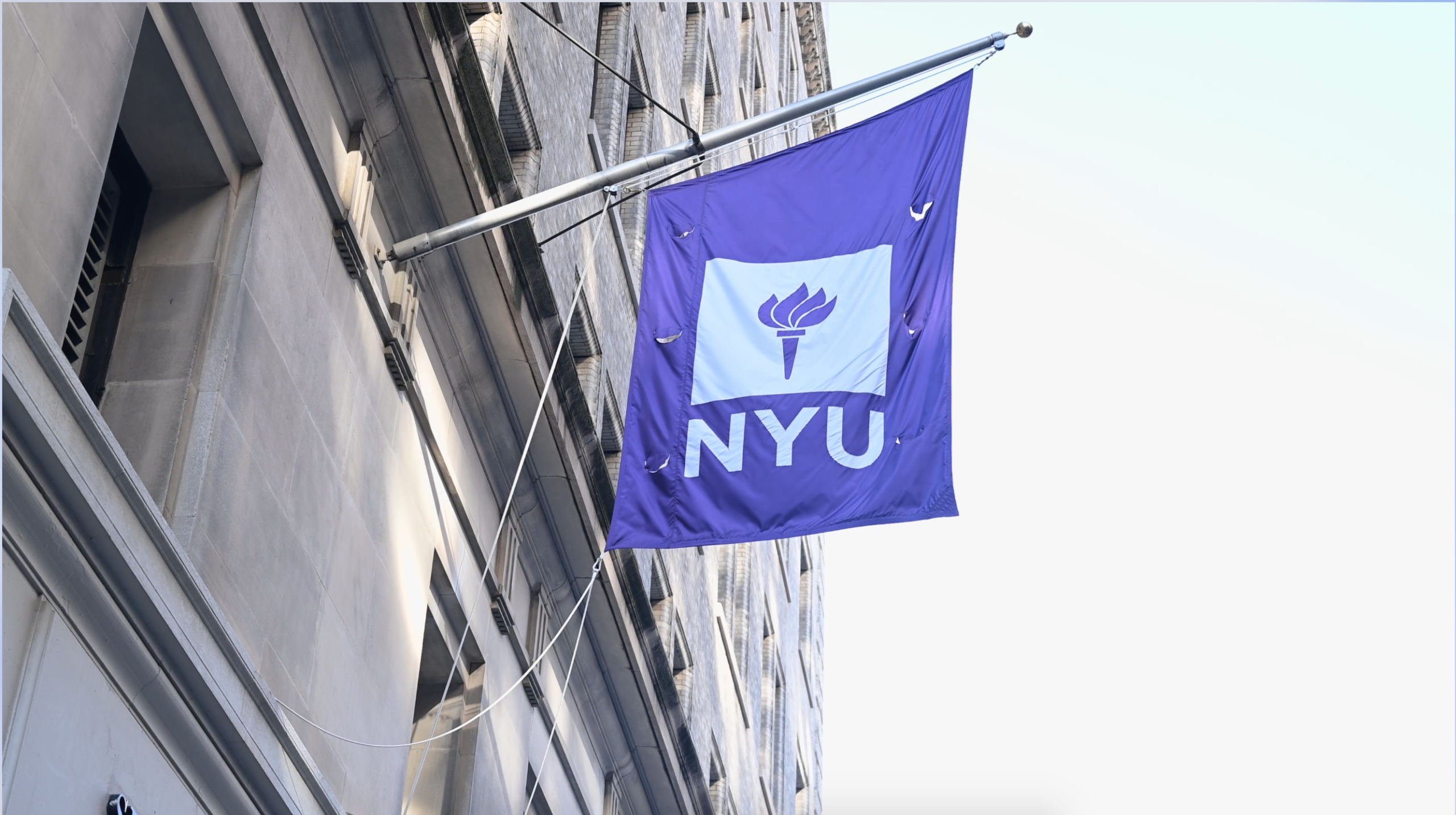 NYU Purple flag waves in the wind